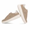 Beige suede low-top sneakers with white rubber sole, laced up, Nautica branding on side and heel