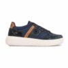 Navy blue sneaker with brown leather accents and a thick off-white sole.