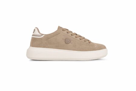 Beige suede Nautica sneaker with perforated heel panel and thick off-white midsole, side logo visible.