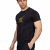 Man wearing a black t-shirt with a yellow Henry Cotton's logo, standing with hands in pockets against a white background.