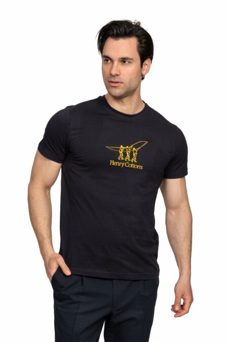 Male model wearing a black T-shirt with a yellow Henry Cotton's logo on the chest (three surfers with a board).
