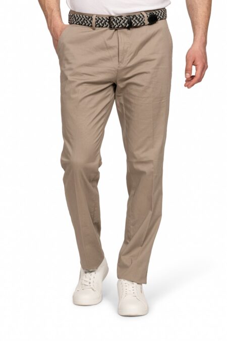 Man wearing taupe chinos with a woven black-and-white belt and white sneakers.