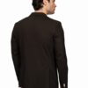 Back view of a man wearing a dark brown blazer and light gray pants.