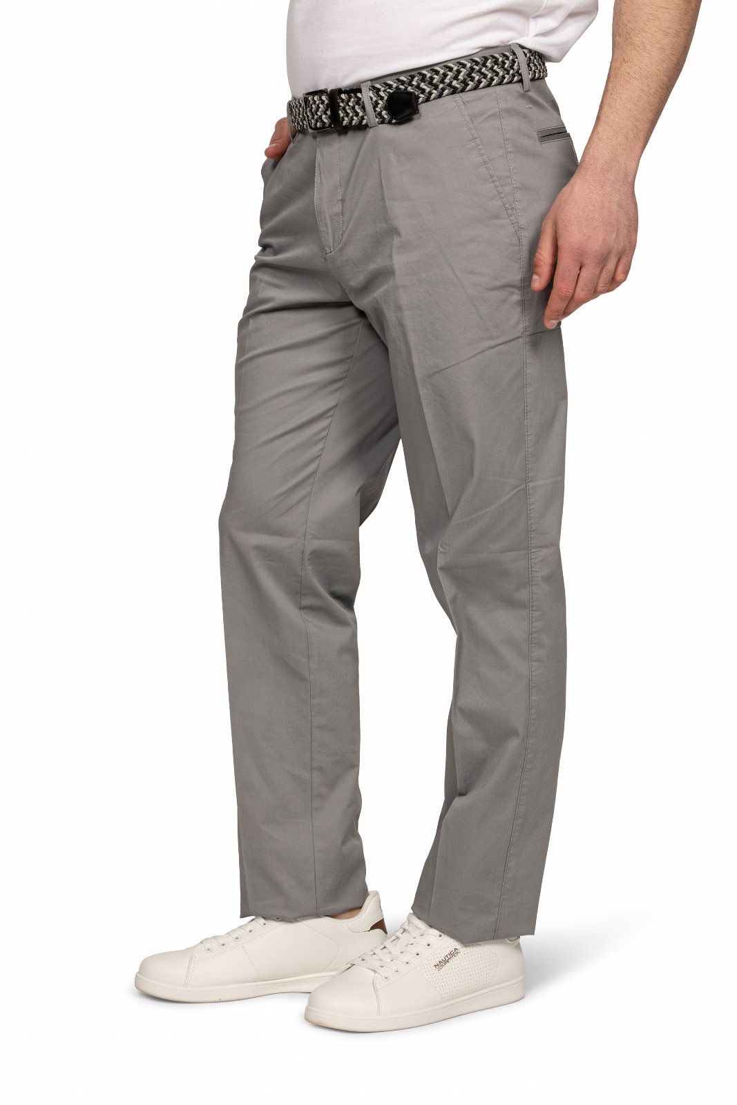 IMG_5167jpg - Noble Person wearing light gray chinos with a black-and-white woven belt and white sneakers.
