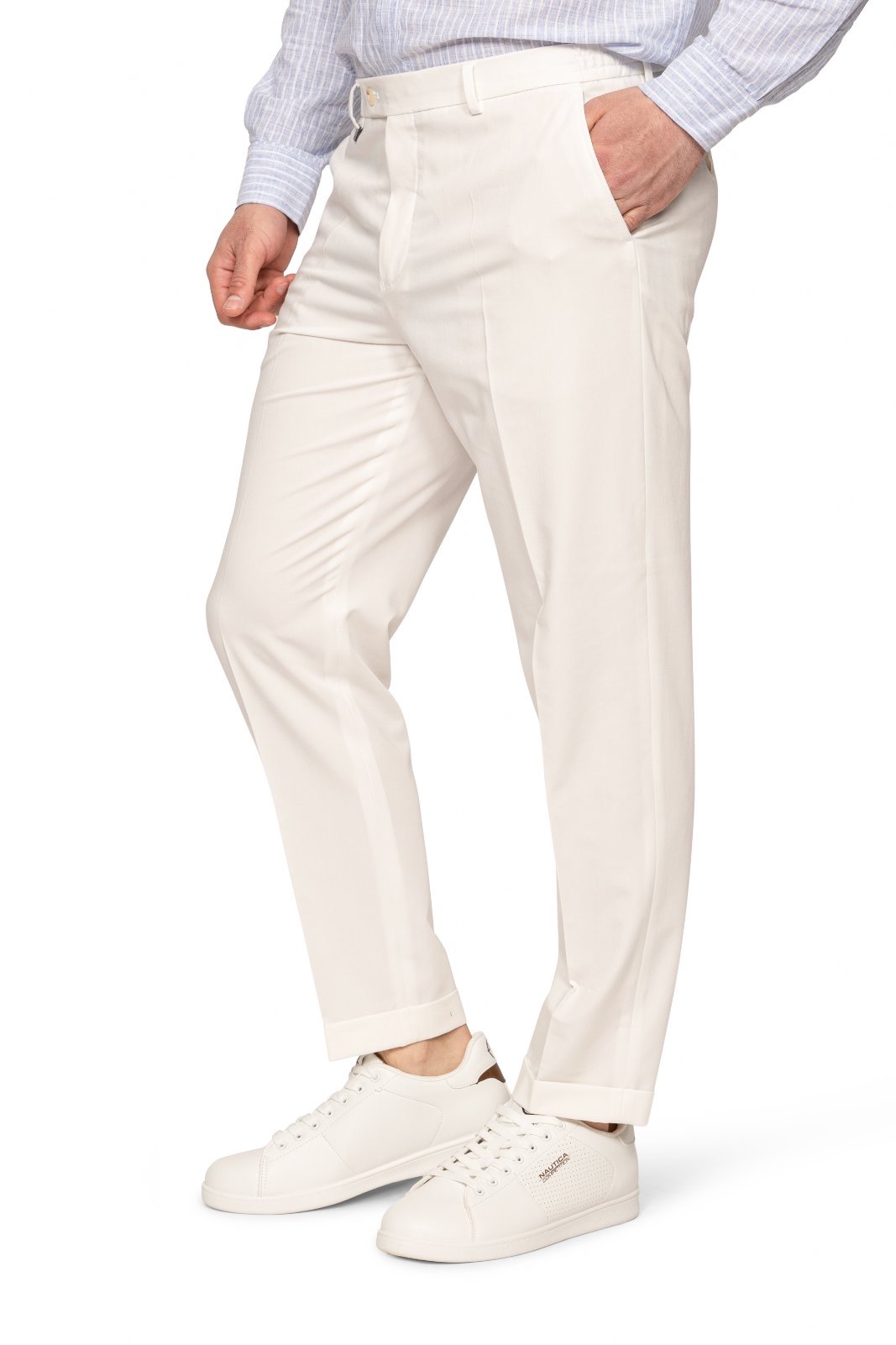 IMG_5193-7jpg - Noble Man wearing cream chinos with cuffed hems and white sneakers, standing in a relaxed pose