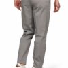 Back view of a person wearing light gray chinos with a braided belt and white sneakers.