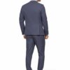Back view of a man in a tailored blue suit with brown dress shoes, standing against a white background