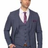 Man in a navy three-piece suit with white shirt and purple tie, looking to the right.