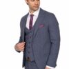 Man in a blue-gray three-piece suit with a white shirt and purple tie, looking to his left while adjusting his jacket.