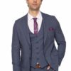 Man in a blue three-piece suit with purple tie, white shirt, and pocket square posing against a white background.